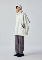 A model wears the HOMME PLISSÉ ISSEY MIYAKE SLIT COAT blouson.