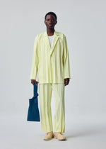 A model wears the HOMME PLISSÉ ISSEY MIYAKE EDGE ENSEMBLE jacket.