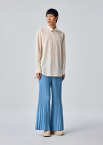 A model wears the HOMME PLISSÉ ISSEY MIYAKE PL RAMIE SHIRT pl-ramie-shirt-shirt-brown-5.