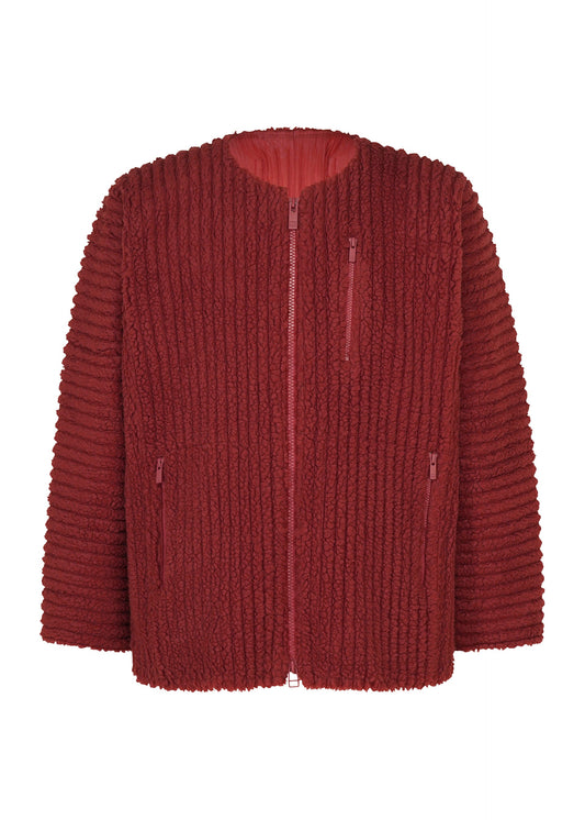 A product shot of the HOMME PLISSÉ ISSEY MIYAKE FLEECE PLEATS blouson in red.