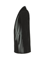 A detail shot of the HOMME PLISSÉ ISSEY MIYAKE IN THE SHADOW jacket.