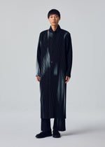 A model wears the HOMME PLISSÉ ISSEY MIYAKE IN THE SHADOW jacket.
