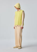 A model wears the HOMME PLISSÉ ISSEY MIYAKE FLEECE PLEATS vest.