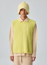 A model wears the HOMME PLISSÉ ISSEY MIYAKE FLEECE PLEATS vest.