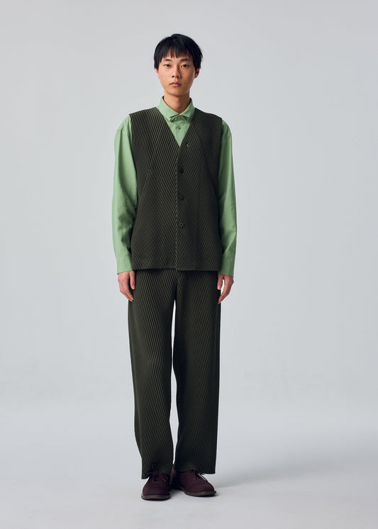 A model wears the HOMME PLISSÉ ISSEY MIYAKE SLASH vest.