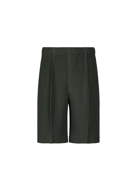 A product shot of the HOMME PLISSÉ ISSEY MIYAKE MONTHLY COLORS : AUGUST pants in inky gray.