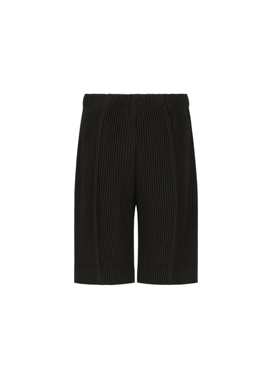 A detail shot of the HOMME PLISSÉ ISSEY MIYAKE MONTHLY COLORS : AUGUST pants.
