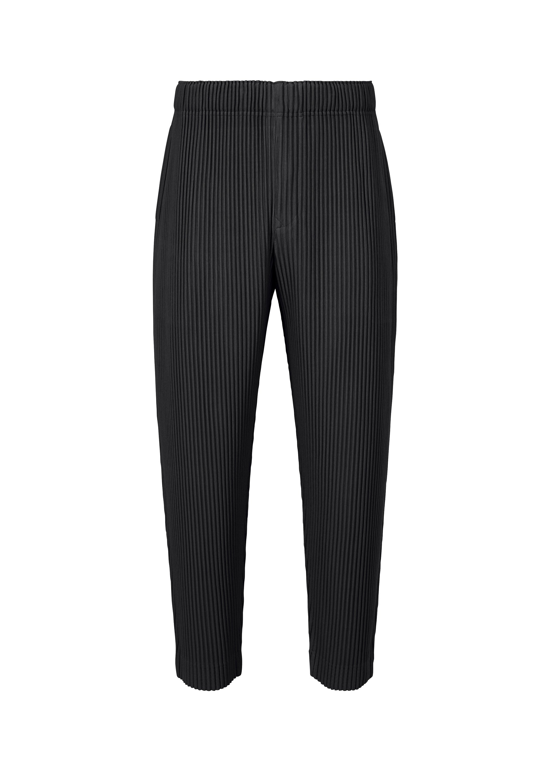 A product shot of the HOMME PLISSÉ ISSEY MIYAKE MONTHLY COLORS : AUGUST pants in black.
