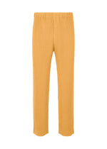 A product shot of the HOMME PLISSÉ ISSEY MIYAKE TAILORED PLEATS 1 pants in glow orange.