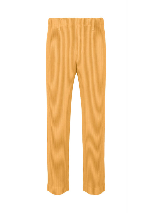 A product shot of the HOMME PLISSÉ ISSEY MIYAKE TAILORED PLEATS 1 pants in glow orange.