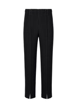 A product shot of the HOMME PLISSÉ ISSEY MIYAKE TAILORED PLEATS 1 pants in black.
