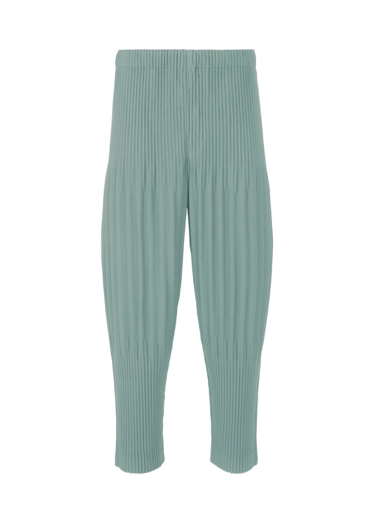 A product shot of the HOMME PLISSÉ ISSEY MIYAKE COLOR PLEATS 2 trousers in gloom blue.