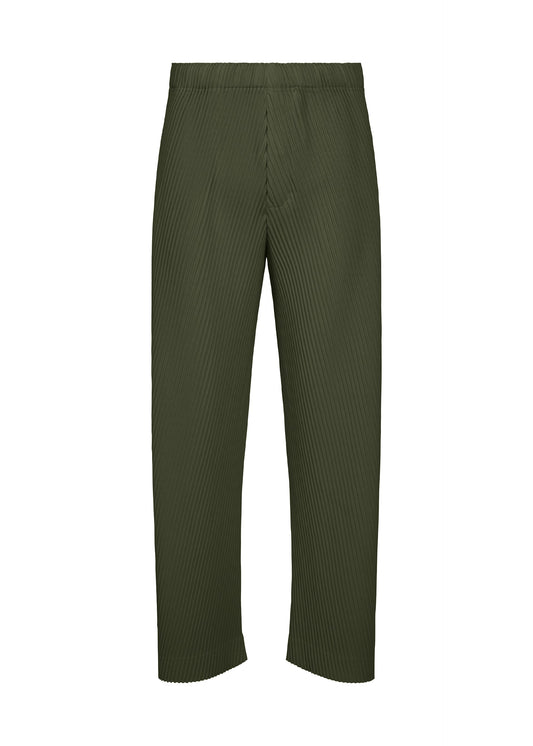 A product shot of the HOMME PLISSÉ ISSEY MIYAKE SLASH trousers in dim green.