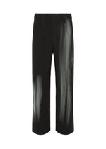 A product shot of the HOMME PLISSÉ ISSEY MIYAKE IN THE SHADOW trousers in shadow black.