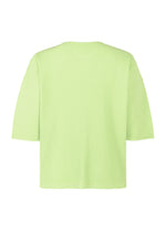 A detail shot of the HOMME PLISSÉ ISSEY MIYAKE MONTHLY COLORS : JULY t-shirt.
