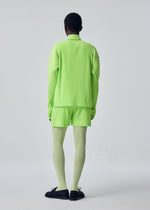 A model wears the HOMME PLISSÉ ISSEY MIYAKE COLOR PLEATS 1 color-pleats-1-t-shirt-darkside-brown.