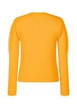 A detail shot of the HOMME PLISSÉ ISSEY MIYAKE COLOR PLEATS 1 shirt.