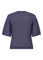 A detail shot of the HOMME PLISSÉ ISSEY MIYAKE RUSTIC MESH t-shirt.