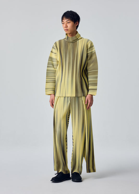 A model wears the HOMME PLISSÉ ISSEY MIYAKE BLEND OF LIGHTS blend-of-lights-t-shirt-brown.