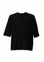 A product shot of the HOMME PLISSÉ ISSEY MIYAKE RELEASE-T BASIC t-shirt in black.