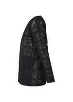 A detail shot of the HOMME PLISSÉ ISSEY MIYAKE LACE GRID PLEATS blouson.