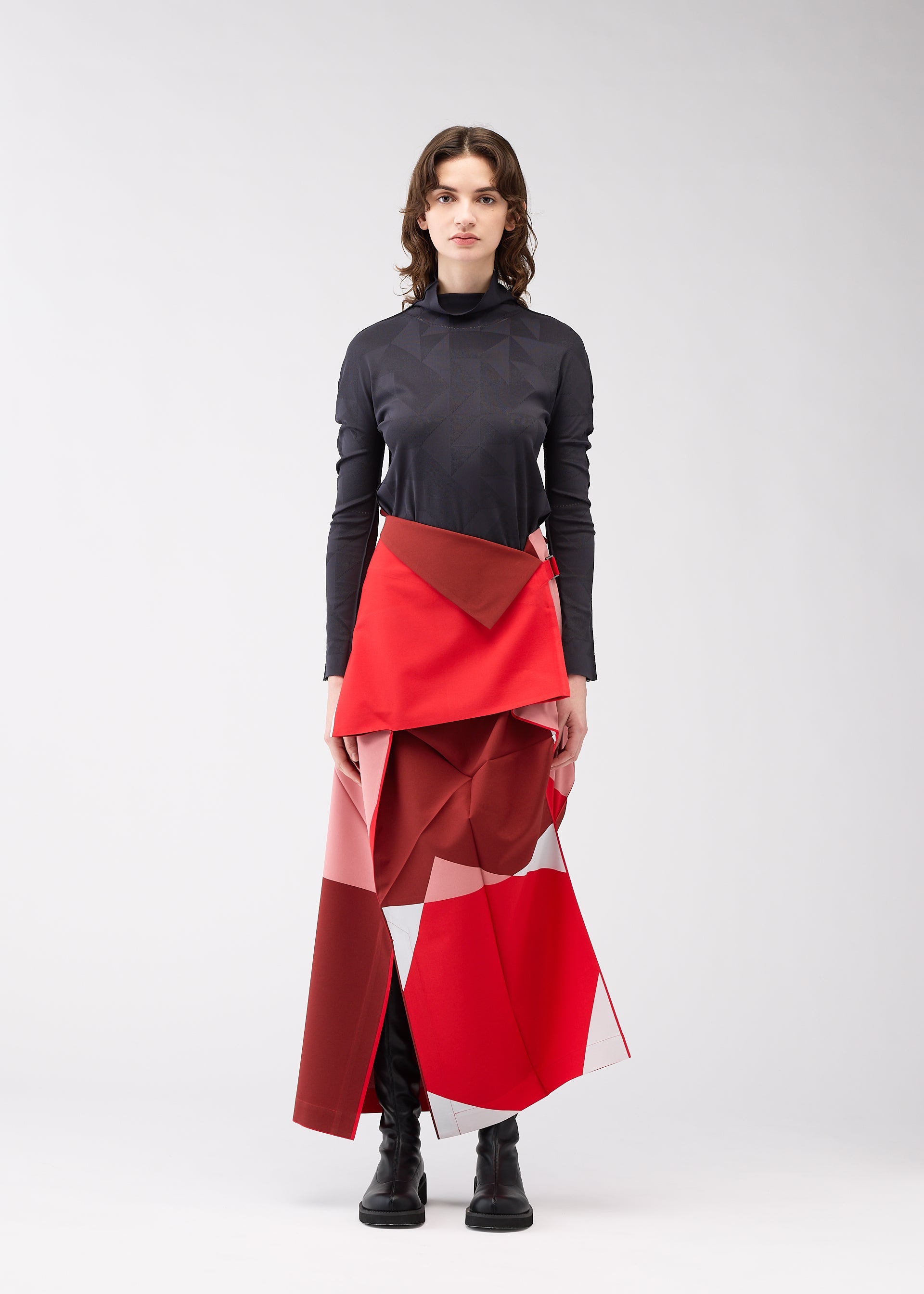 A model wears the 132 5. Issey Miyake POSITIONS skirt.