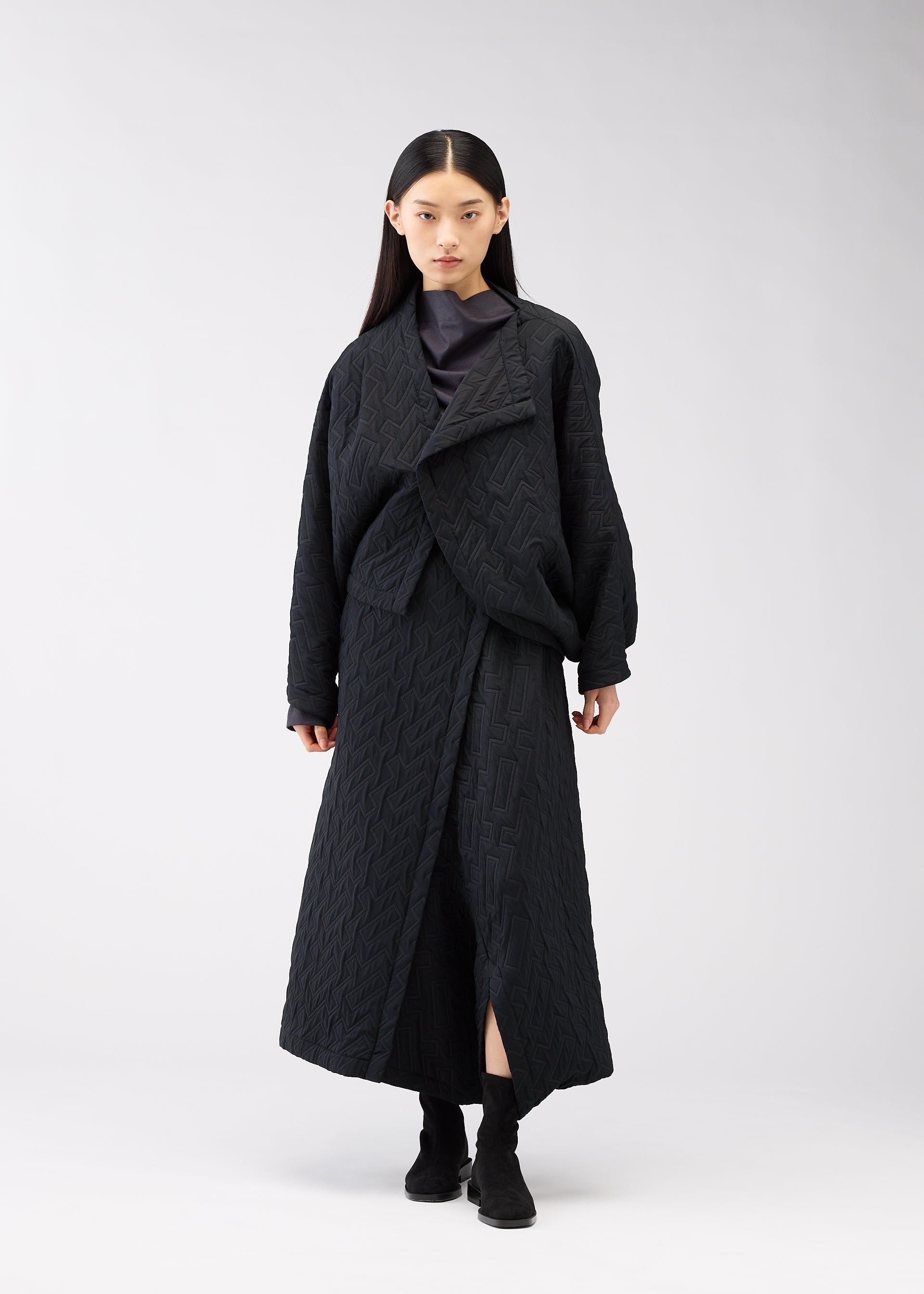 A model wears the 132 5. Issey Miyake ONE CLOTH PUFF cardigan.