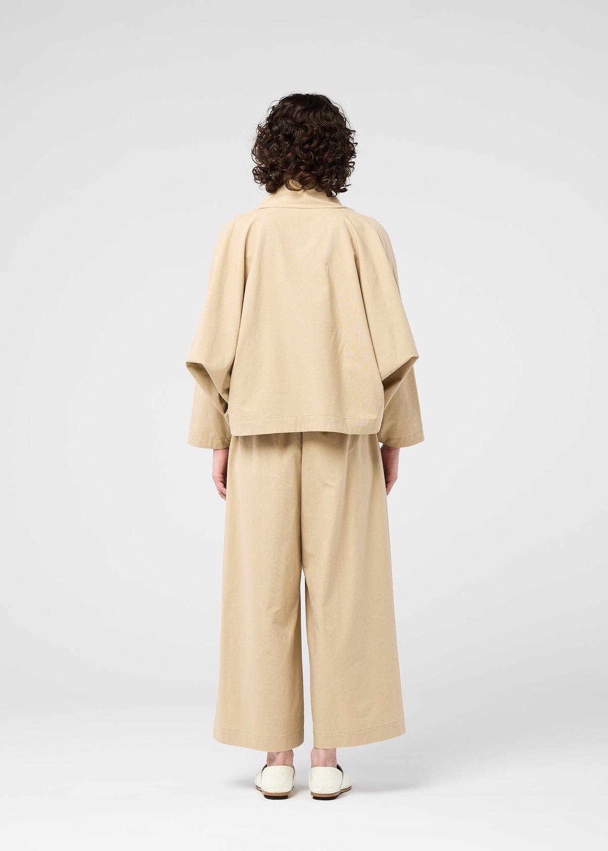 A model wears the 132 5. Issey Miyake WASHI STRETCH jacket.