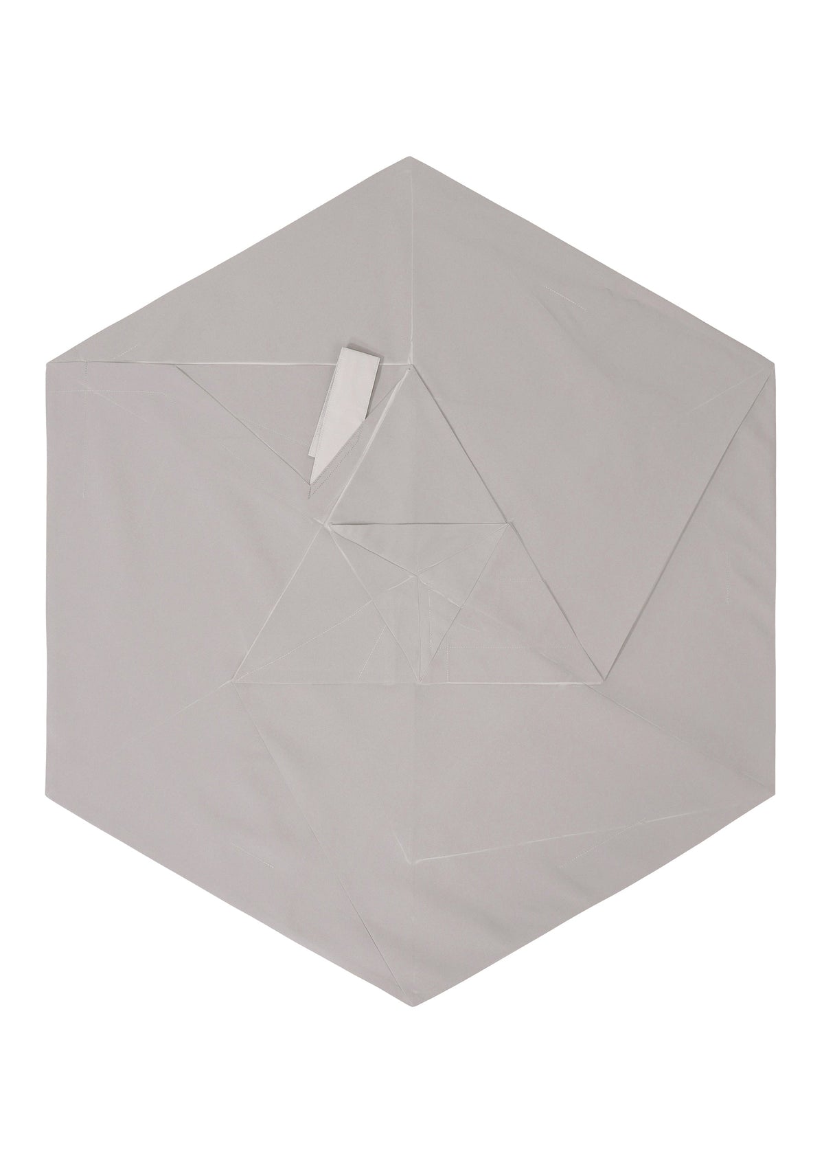 A detail shot of the 132 5 ISSEY MIYAKE PENTAGON prêt à porter.