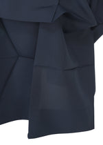 A detail shot of the 132 5. ISSEY MIYAKE NO.6 SOLID dress.