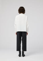 A model wears the 132 5 ISSEY MIYAKE FOLD SHIRT prêt à porter.