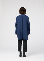A model wears the 132 5 ISSEY MIYAKE FOLD SHIRT prêt à porter.