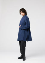 A model wears the 132 5 ISSEY MIYAKE FOLD SHIRT prêt à porter.