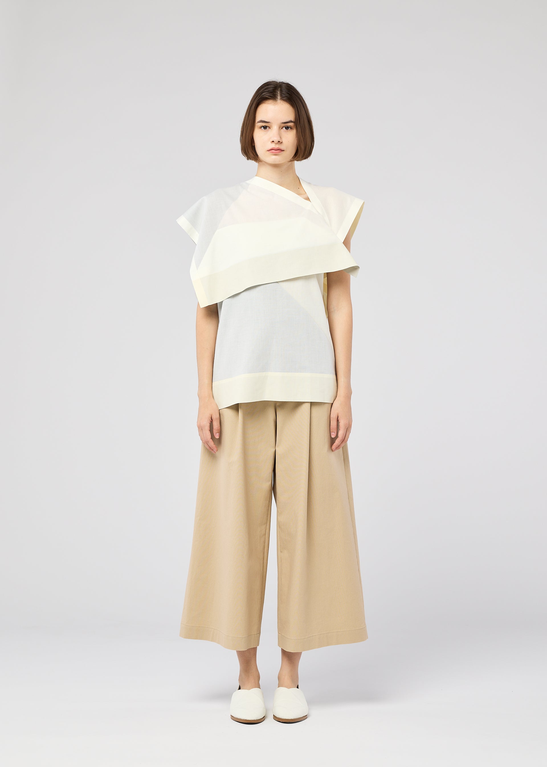 A model wears the 132 5. Issey Miyake FOLD RAMIE PRINT shirt.