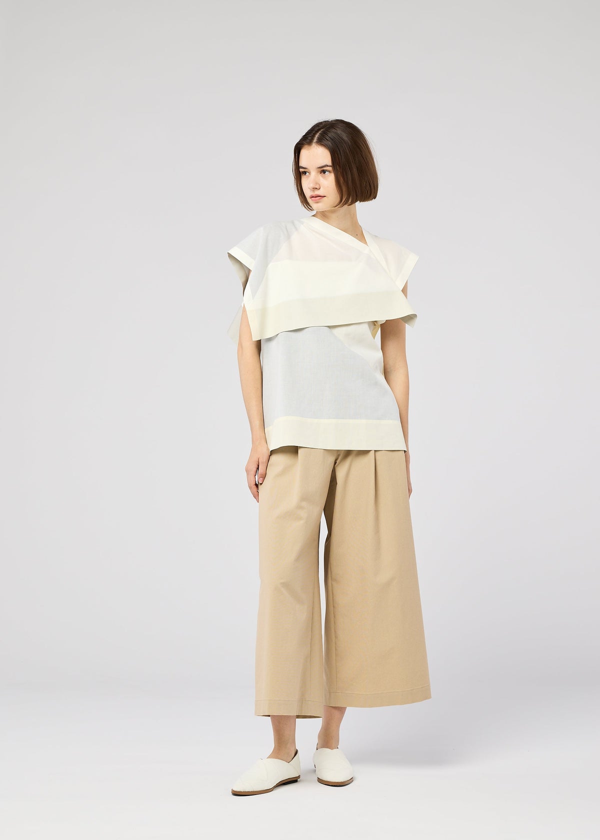 A model wears the 132 5. Issey Miyake FOLD RAMIE PRINT shirt.