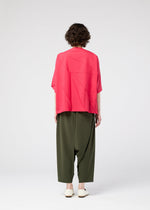 A model wears the 132 5. Issey Miyake RADIAL FOLD Top top.