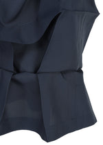 A detail shot of the 132 5. ISSEY MIYAKE NO.6 SOLID shirt.
