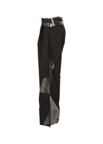 A detail shot of the 132 5. ISSEY MIYAKE F-BT trousers.