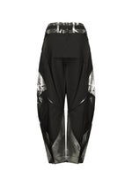 A detail shot of the 132 5. ISSEY MIYAKE F-BT trousers.