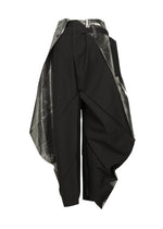 A detail shot of the 132 5. ISSEY MIYAKE F-BT trousers.