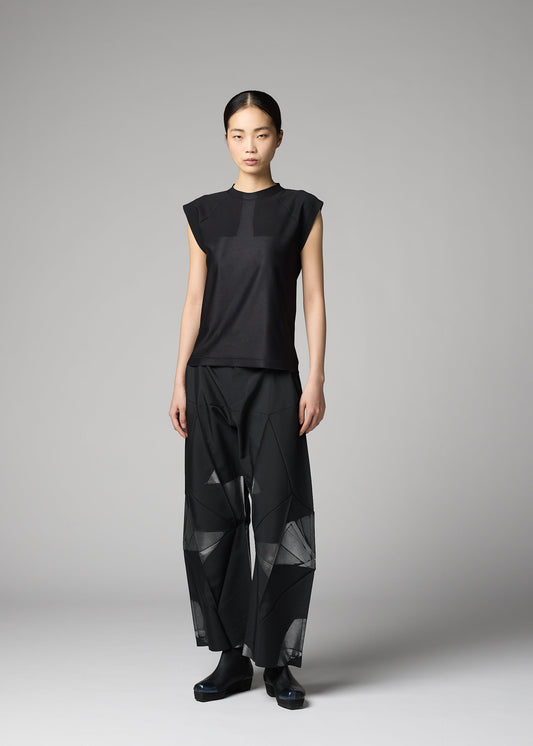 A model wears the 132 5. ISSEY MIYAKE F-KN f-kn-blouse-black.