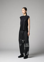 A model wears the 132 5. ISSEY MIYAKE F-KN f-kn-blouse-black.