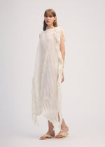 A model wears the ISSEY MIYAKE WRINKLED AND TWISTED dress.