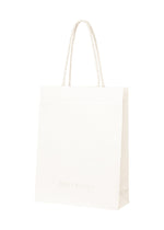 A product shot of the ISSEY MIYAKE THIS IS A PAPER BAG bag in white (01).