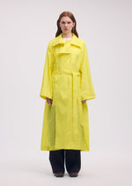 A model wears the Issey Miyake AERIAL STEEL coat.