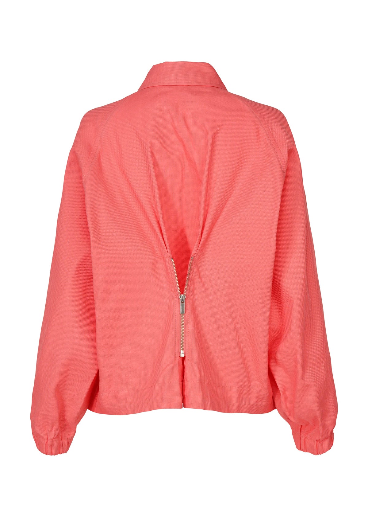 A detail shot of the Issey Miyake PEEKABOO jacket.