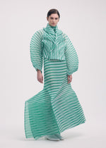 A model wears the Issey Miyake GENERIC STRIPES HAND PLEATS jacket.
