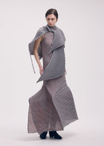 A model wears the Issey Miyake GENERIC STRIPES HAND PLEATS vest.