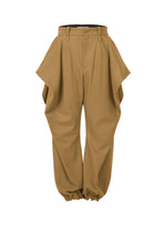 A detail shot of the Issey Miyake WOOL TWEED PANTS trousers.