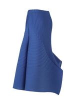 A detail shot of the ISSEY MIYAKE FOLD PLEATS skirt.